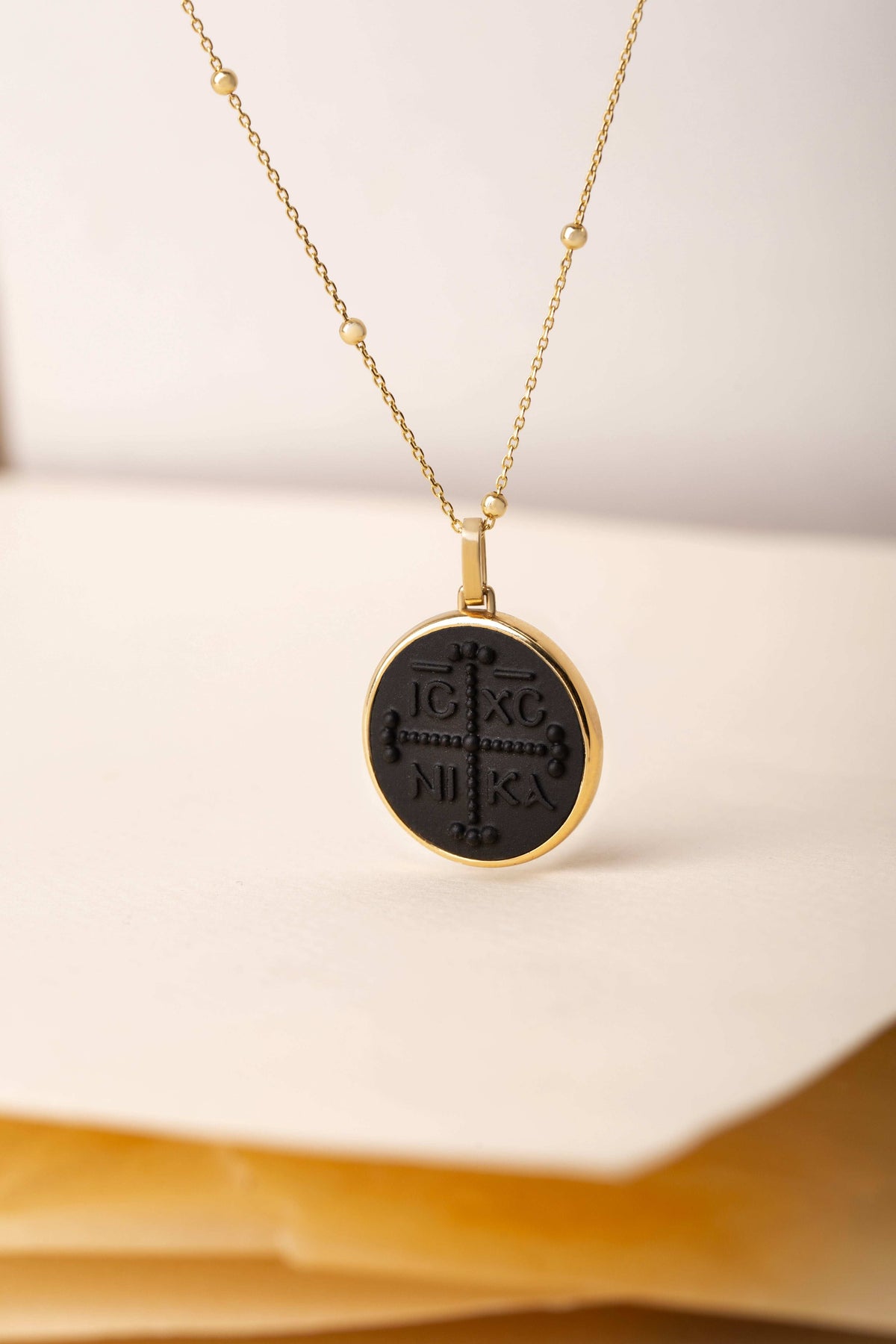 ONYX ICXC NIKA CROSS NECKLACE