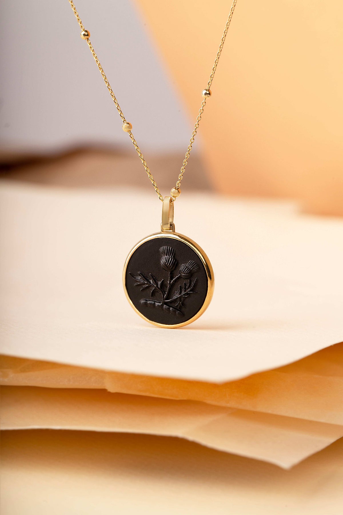 ONYX THISTLE NECKLACE