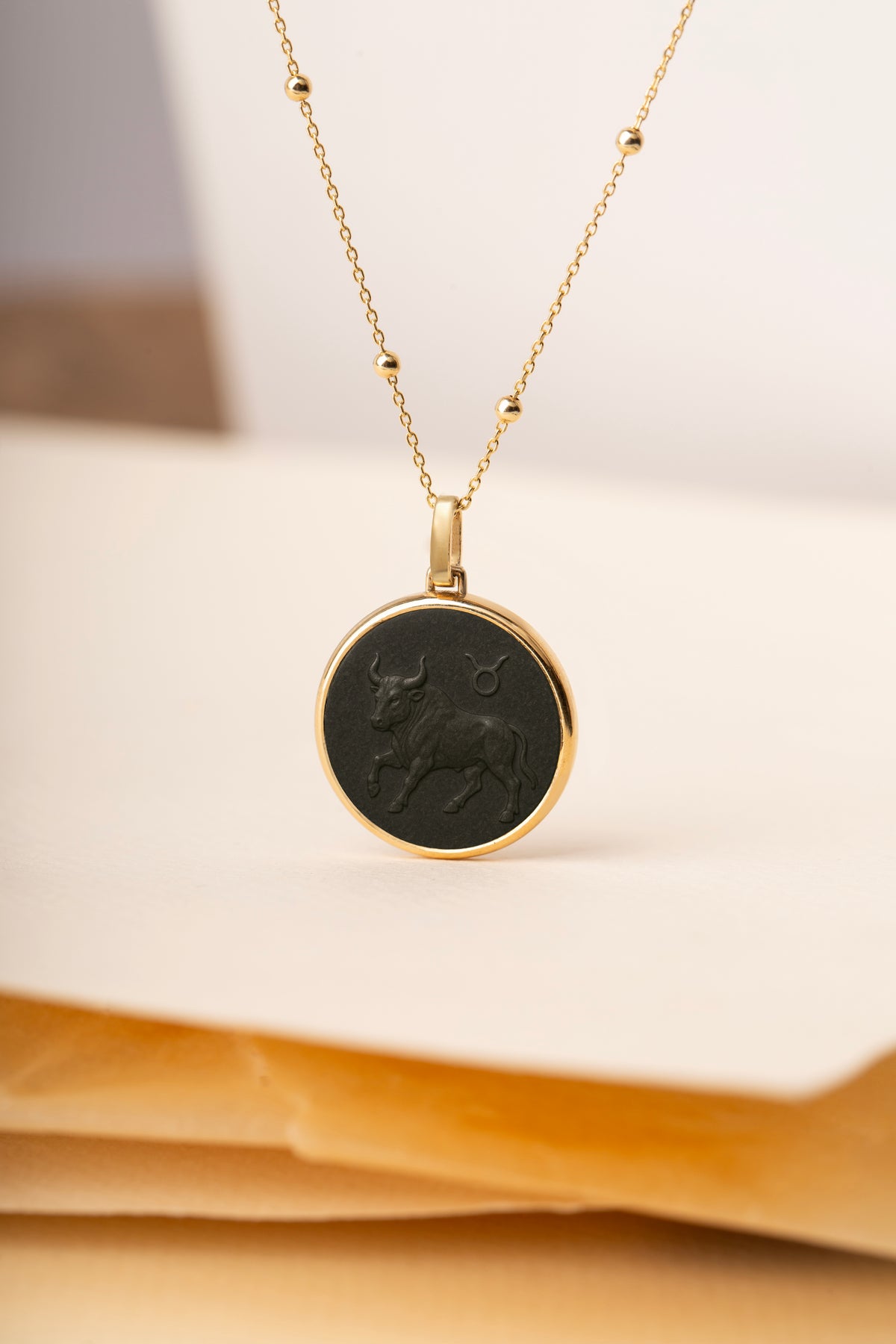 ONYX TAURUS NECKLACE